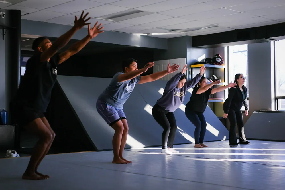 Yoga class at Rising Tide MoCo MMA martial arts academy in Rockville, Maryland